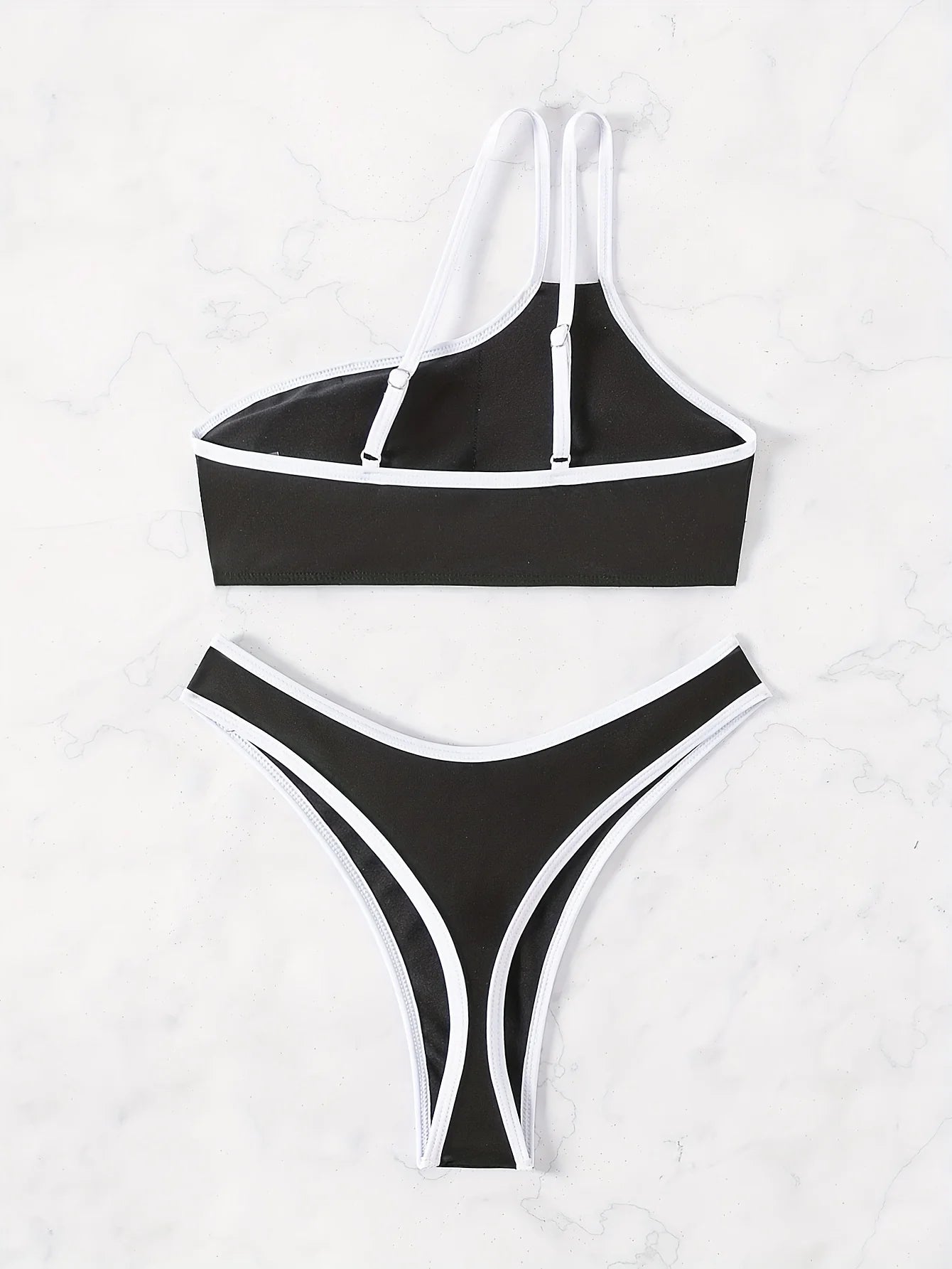 Bikini string bandeau asymétrique push-up noir et blanc Murcia - GUAPPAA