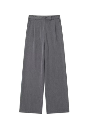 Pantalon La Ligne Droite noir à taille haute avec fermeture zippée sur le devant