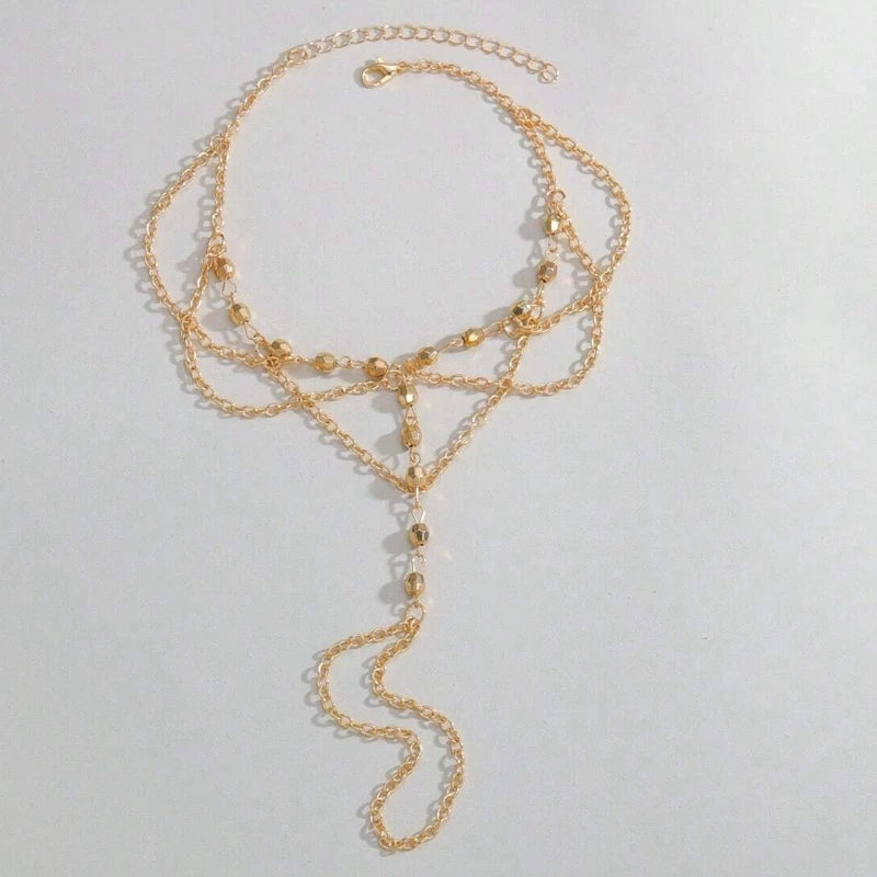 Bracelet de pied chaîne multi-rangs avec anneau orteil Formentera