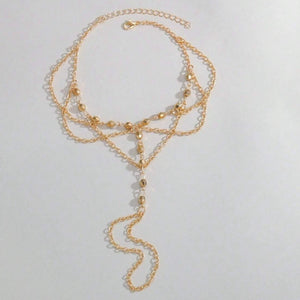 Bracelet de pied chaîne multi-rangs avec anneau orteil Formentera