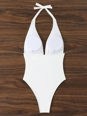 Vue de profil du maillot Cala Vela uni à encolure licou pour plage et piscine