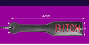 Accessoire de plage ou lingerie, paddle noir avec lettrage rouge, dimensions 32x6,5 cm, GUAPPAA