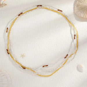 Set de chaînes de taille bohèmes L’Été Nomade, détail des éléments décoratifs ronds