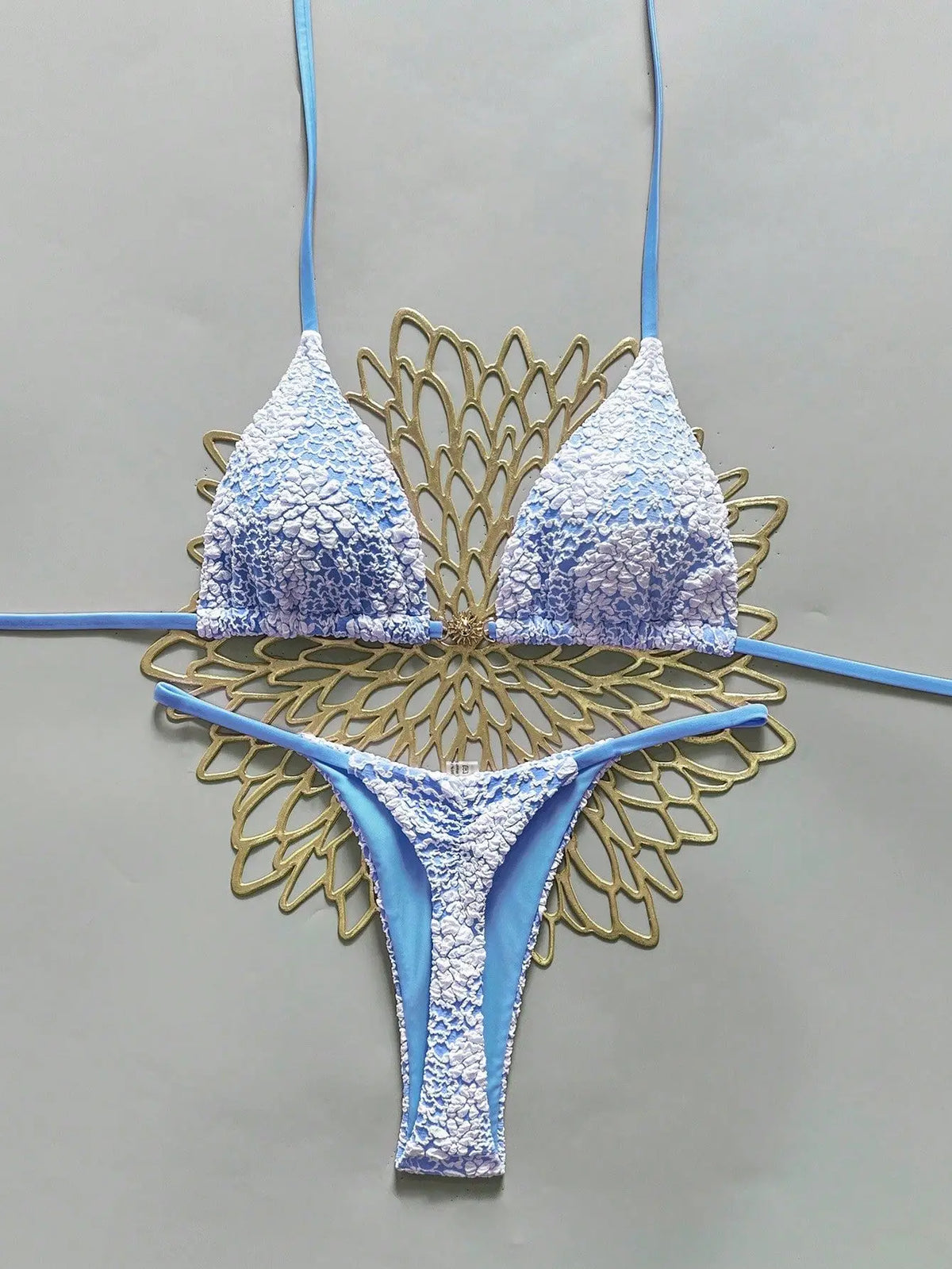 Micro bikini L’Onde Azur deux pièces avec haut licou rembourré et bas string taille basse, vue principale