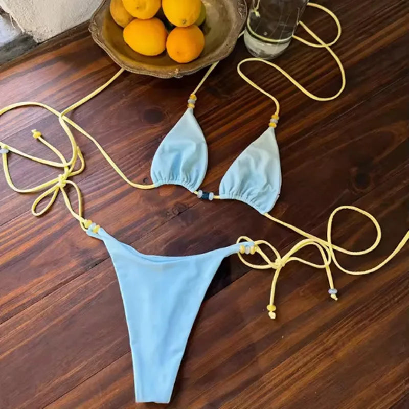 Bikini bandeau Cala Sol Guappaa avec coupe deux pièces taille basse et coloris lumineux