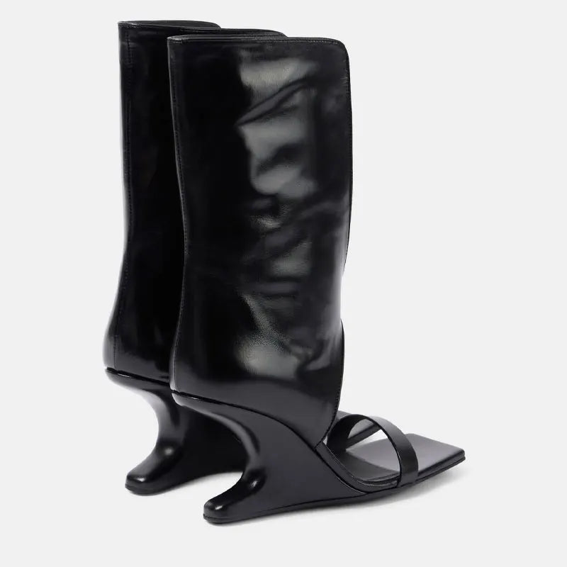 Bottes La Riviera brunes mi-mollet avec silhouette mode proposées chez Guappaa