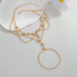 Bracelet de pied chaîne multi-rangs avec anneau orteil Formentera