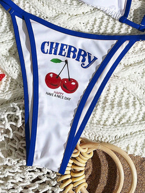 Maillot Cala imprimé cerises décliné en plusieurs coloris, vue portée pour piscine et vacances, Guappaa