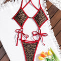 Maillot de bain une pièce tanga imprimé léopard La Fauve, liserés rouges, vue produit face